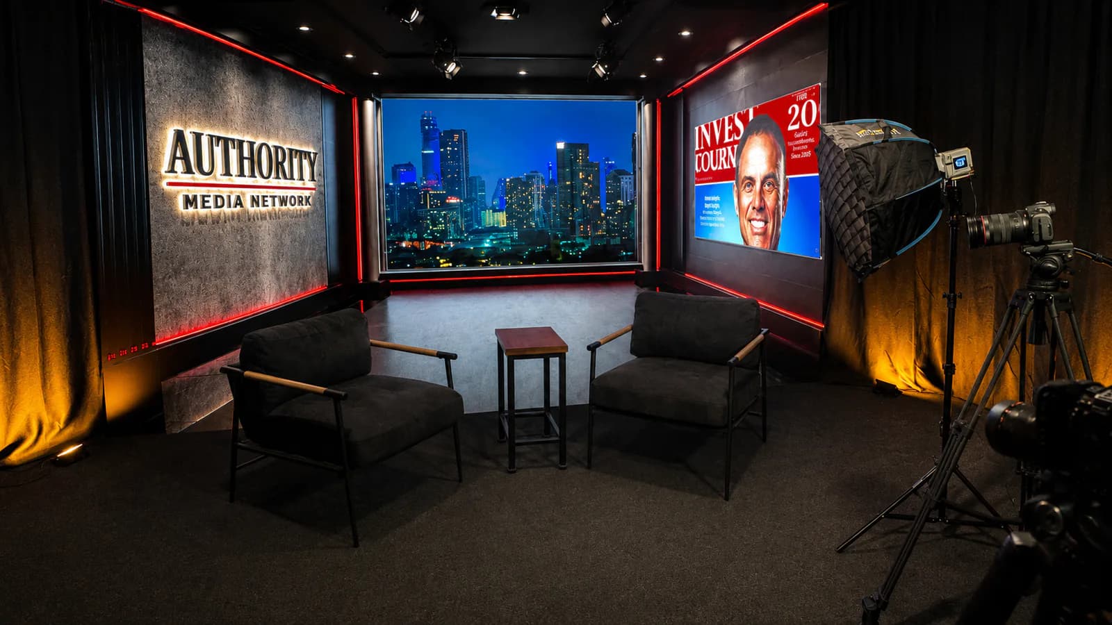 Authority Media Network interview set with two chairs, cameras, lighting, and magazine display
